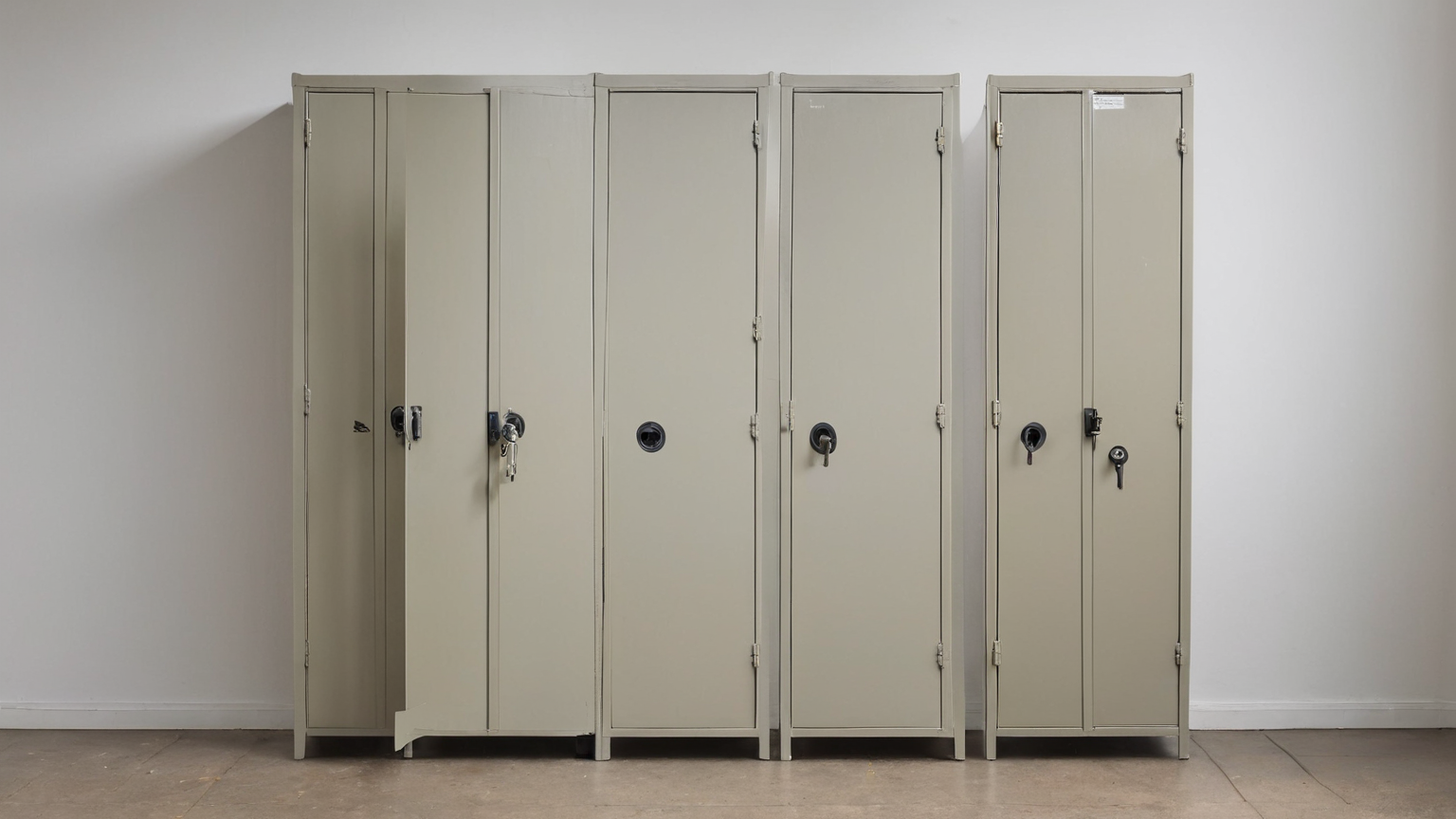 Closed lockers representing containment and controlled client boundaries